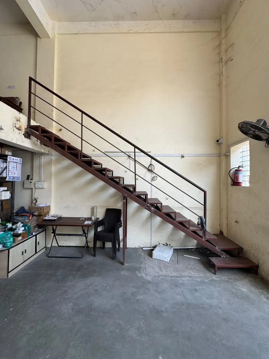 MS staircase with fabricated railing installed indoors
