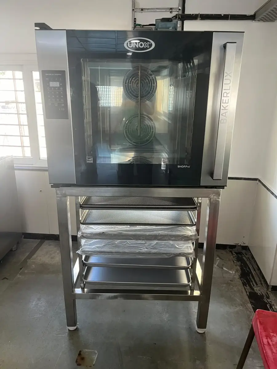 Stainless steel oven base trolley and stand under a rack oven