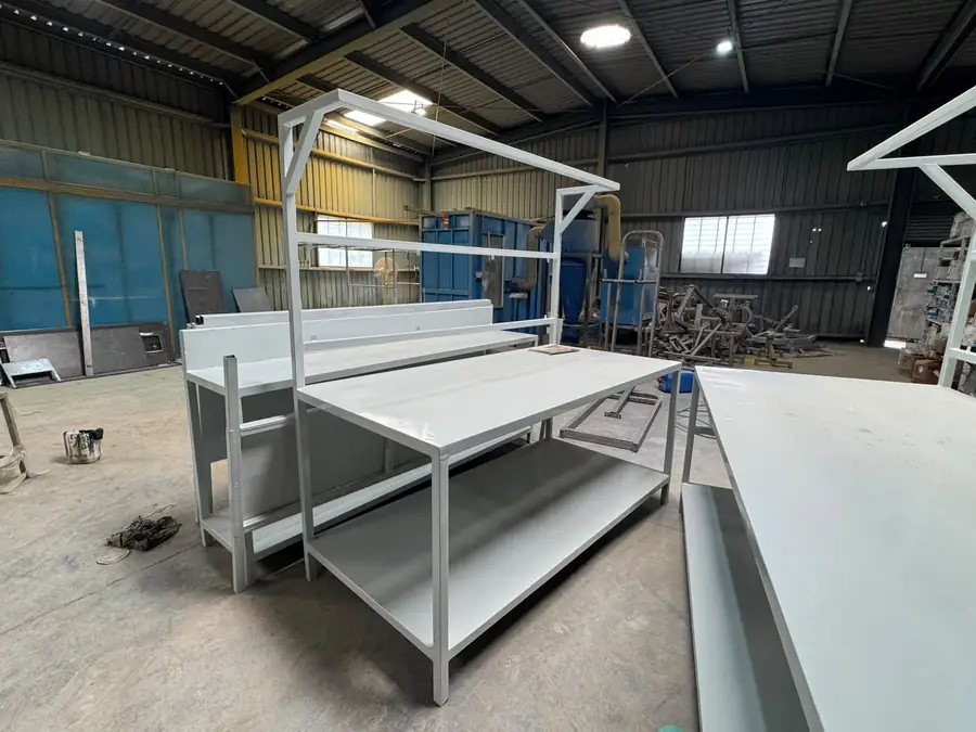Stainless steel work tables fabricated for a food production hall