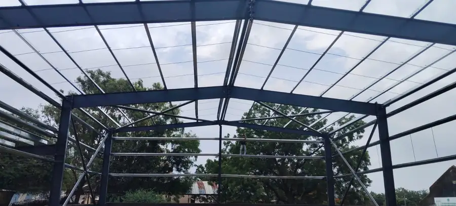 Underside of a fabricated shed roof frame with bracing