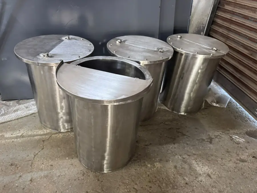 Three stainless steel storage tanks with lids fabricated in SS 304