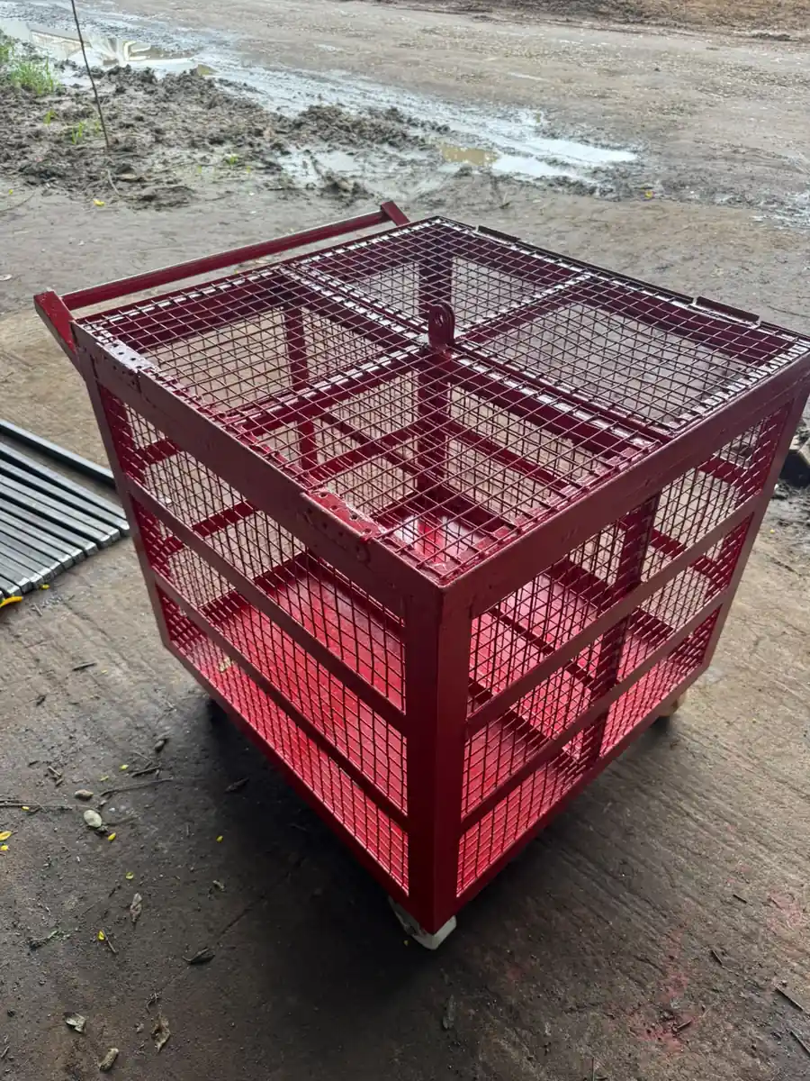 Red mesh stillage cage fabricated for component storage
