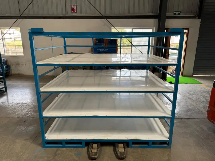 Shelf trolley on castor wheels for factory material movement