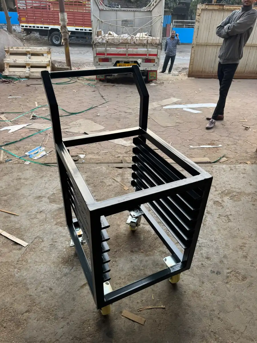 Slotted cage trolley with push handle for panel handling